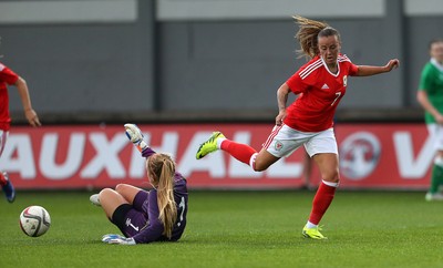 190816 - Wales Women v Republic of Ireland, Friendly Challenge - Natasha Harding of Wales tangles with keeper Grace Moloney of Ireland