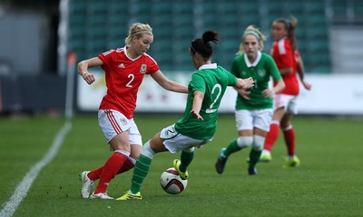 190816 - Wales Women v Republic of Ireland, Friendly Challenge - Rhiannon Roberts of Wales is tackled by Sophie Perry of Ireland