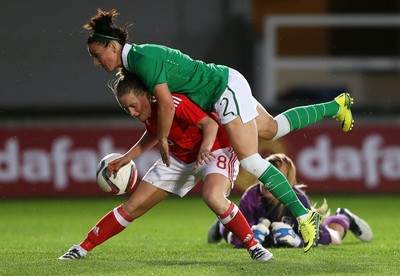 190816 - Wales Women v Republic of Ireland, Friendly Challenge - Rachel Rowe of Wales is forcefully taken down in the box by Sophie Perry of Ireland