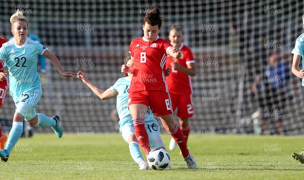 120618 - Wales Women v Russia Women - FIFA Women's World Cup Qualifying Round - Angharad James of Wales is tackled by Lipa Yakupova of Russia