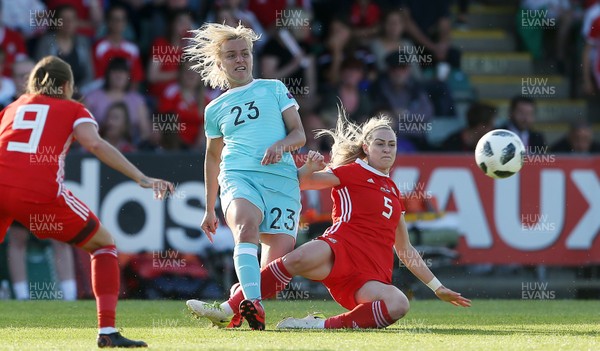 120618 - Wales Women v Russia Women - FIFA Women's World Cup Qualifying Round - Elena Morozova of Russia is tackled by Rhiannon Roberts of Wales