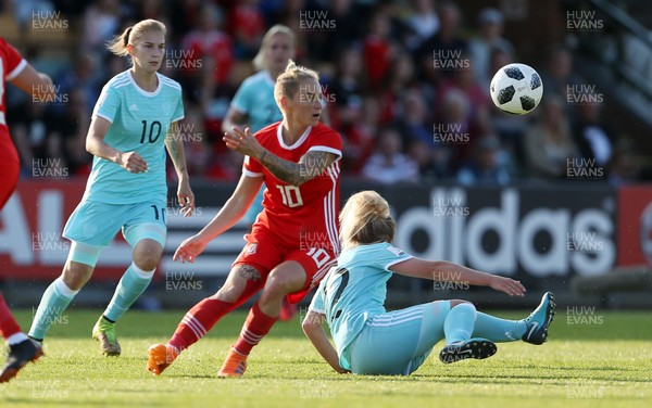 120618 - Wales Women v Russia Women - FIFA Women's World Cup Qualifying Round - Jess Fishlock of Wales is challenged by Anastasiya Akimova of Russia