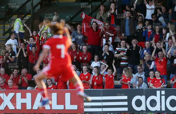 120618 - Wales Women v Russia Women - FIFA Women's World Cup Qualifying Round - Natasha Harding of Wales celebrates scoring a goal with the crowd
