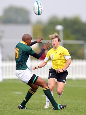  Huw Evans Agency 2010 - Wales' Mared Evans chips through past Zandile Nojoko - Wales v South Africa  - Women's  Rugby World Cup - (9th Place Play-Off)Surrey Sports Park - 05/09/2010 - All rights reserved