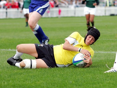 Huw Evans Agency 2010 - Wales' Ceri Redman  dives on a kick through to score a try Wales v South Africa  - Women's  Rugby World Cup - (9th Place Play-Off)Surrey Sports Park - 05/09/2010 - All rights reserved