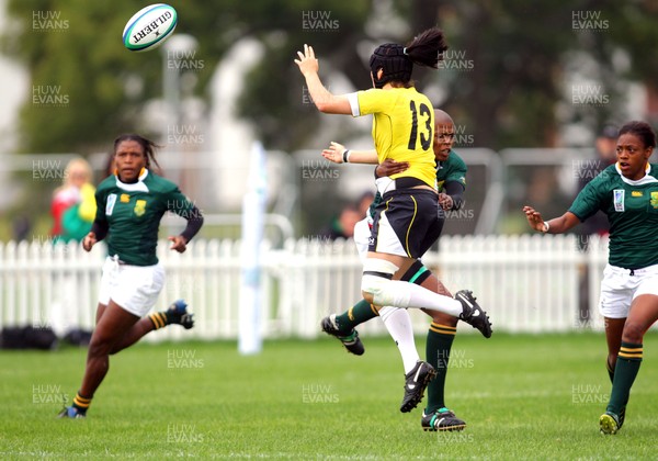 Huw Evans Agency 2010 -  Wales' Ceri Redman manages to pass while being lifted off her feet to set up  Naomi Thomas' early try -Wales v South Africa  - Women's  Rugby World Cup - (9th Place Play-Off)Surrey Sports Park - 05/09/2010 - All rights reserved