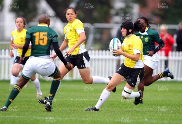 Huw Evans Agency 2010 - Wales' Ceri Redman manages breaks to set up  Naomi Thomas' early tryWales v South Africa  - Women's  Rugby World Cup - (9th Place Play-Off)Surrey Sports Park - 05/09/2010 - All rights reserved