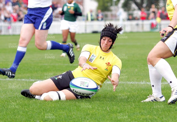 Huw Evans Agency 2010 - Wales' Ceri Redman  dives on a kick through to score a try - Wales v South Africa  - Women's  Rugby World Cup - (9th Place Play-Off)Surrey Sports Park - 05/09/2010 - All rights reserved