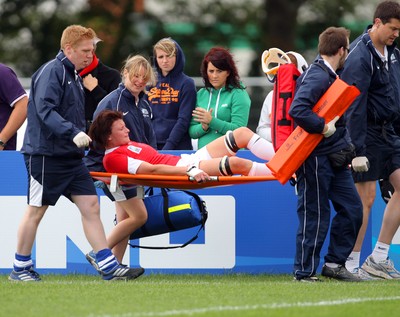  Huw Evans Agency 2010 - Wales' Rachel Taylor is carried off with an injury - Wales v South Africa  - Women's  Rugby World Cup - Surrey Sports Park - 24/08/2010 - All rights reserved
