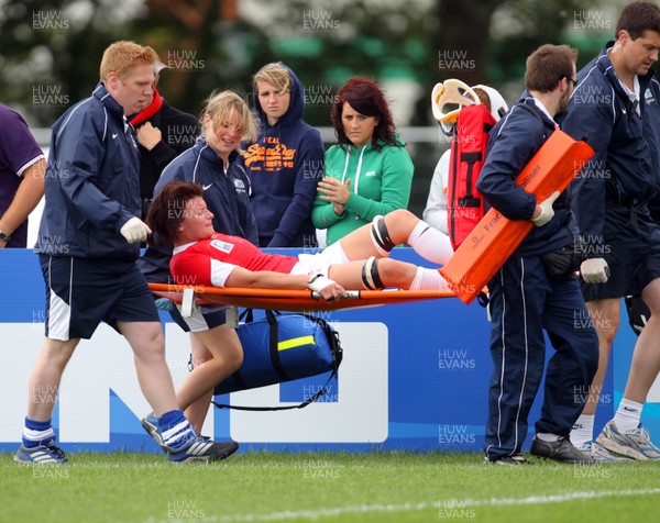  Huw Evans Agency 2010 - Wales' Rachel Taylor is carried off with an injury - Wales v South Africa  - Women's  Rugby World Cup - Surrey Sports Park - 24/08/2010 - All rights reserved