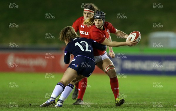 020218 - Wales Women v Scotland Women - Natwest 6 Nations - Beth Lewis of Wales is tackled by Lisa Martin of Scotland