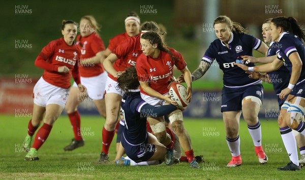 020218 - Wales Women v Scotland Women - Natwest 6 Nations - Alisha Butchers of Wales is tackled by Helen Nelson of Scotland