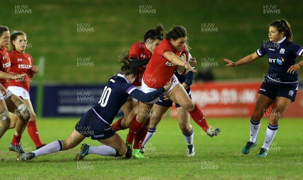 020218 - Wales Women v Scotland Women - Natwest 6 Nations - Siwan Lillicrap of Wales is tackled by Helen Nelson of Scotland