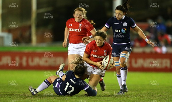 020218 - Wales Women v Scotland Women - Natwest 6 Nations - Alisha Butchers of Wales is tackled by Lisa Martin of Scotland
