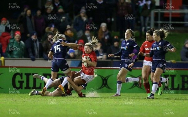 020218 - Wales Women v Scotland Women - Natwest 6 Nations - Hannah Bluck of Wales is tackled by Chloe Rollie of Scotland