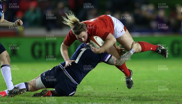 020218 - Wales Women v Scotland Women - Natwest 6 Nations - Gwenllian Pyers of Wales is tackled by Jade Konkel of Scotland