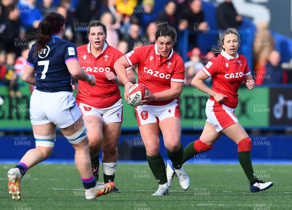020422 - Wales Women v Scotland Women - TikTok Women’s Six Nations - Siwan Lillicrap of Wales is tackled by Rachel Malcolm of Scotland