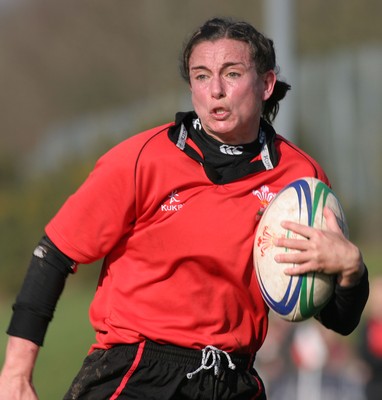 02.02.08 The Women's 6 Nations. Wales vs. Scotland. Taff Well RFC. Cardiff, Wales.  Louise Rickard shows races away to score for Wales.  