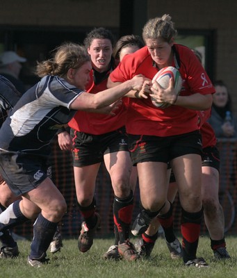 02.02.08 The Women's 6 Nations. Walesvs. Scotland. Taffs Well RFC, Cardiff, Wales.  Gemma Hallett brushes off Heather Lockhart.   
