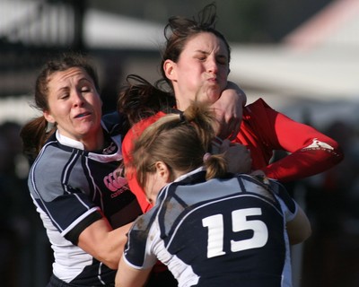 02.02.08 The Women's 6 Nations. Walesvs. Scotland. Taffs Well RFC, Cardiff, Wales.  Hayley Baxter is collared by Julie Sanaghan(L) & Lynsey Douglas(15).  