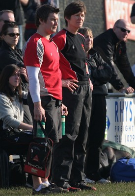 02.02.08 The Women's 6 Nations. Wales vs. Scotland. Taffs Well RFC, Cardiff, Wales.  Conditioning coach coach Ryan Harris(L) & attached coach Liza Burgess look on as Wales Women take on Scottish at Taffs Well RFC.  