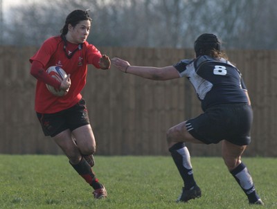 02.02.08 The Women's 6 Nations. Wales vs. Scotland. Taffs Well RFC, Cardiff, Wales. 
 
Naomi Thomas looks to hand off Sonia Cuff. 
 

