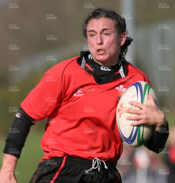 02.02.08 The Women's 6 Nations. Wales vs. Scotland. Taff Well RFC. Cardiff, Wales.  Louise Rickard shows races away to score for Wales.  