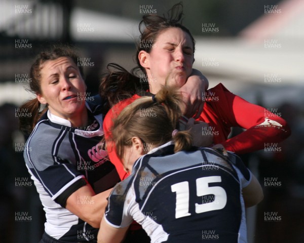 02.02.08 The Women's 6 Nations. Walesvs. Scotland. Taffs Well RFC, Cardiff, Wales.  Hayley Baxter is collared by Julie Sanaghan(L) & Lynsey Douglas(15).  