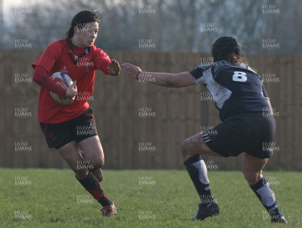 02.02.08 The Women's 6 Nations. Wales vs. Scotland. Taffs Well RFC, Cardiff, Wales. 
 
Naomi Thomas looks to hand off Sonia Cuff. 
 
