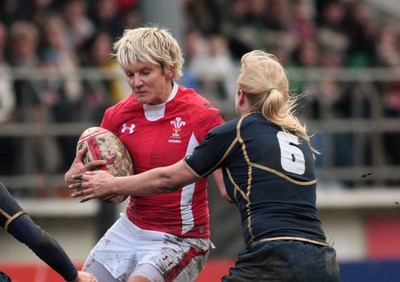 120212 Wales v Scotland - Womens 6 Nations rugby -  Wales' Phillippa Tuttiett takes on Scotland's Tess Forsberg