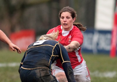 120212 Wales v Scotland - Womens 6 Nations rugby -  Wales' Jenny Davies takes on Scotland's Louise Dalgliesh 