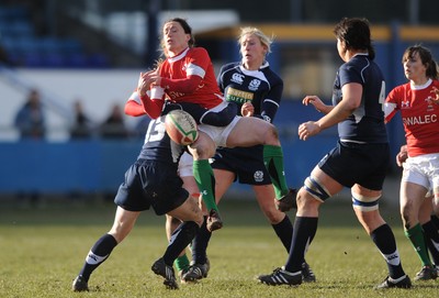 14.02.10 - Wales Women v Scotland Women- Womens Six Nations 2010 - Mellissa Berry of Wales takes high ball as Lucy Millard tackles. 