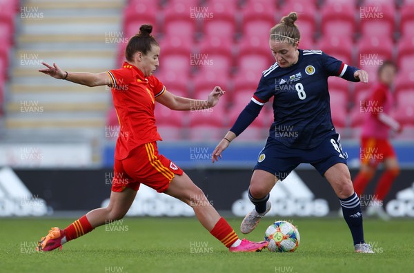 150621 - Wales Women v Scotland Women - International Friendly - Kim Little of Scotland is tackled by Angharad James of Wales