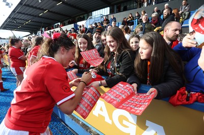 131121 - Wales Women v South Africa Women - Autumn Internationals - Georgia Evans of Wales signs autographs