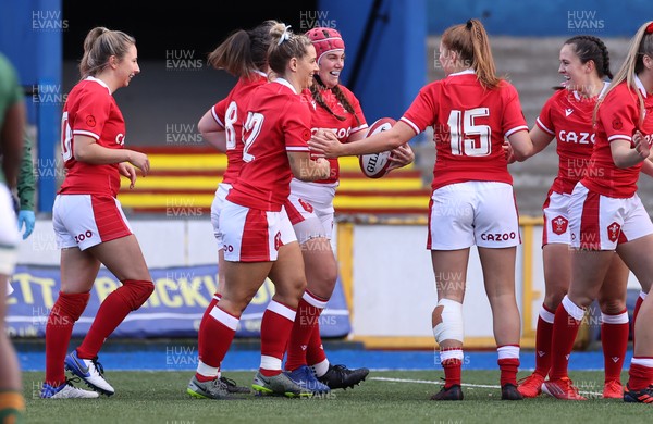 131121 - Wales Women v South Africa Women - Autumn Internationals - Carys Phillips of Wales celebrates scoring a try with team mates