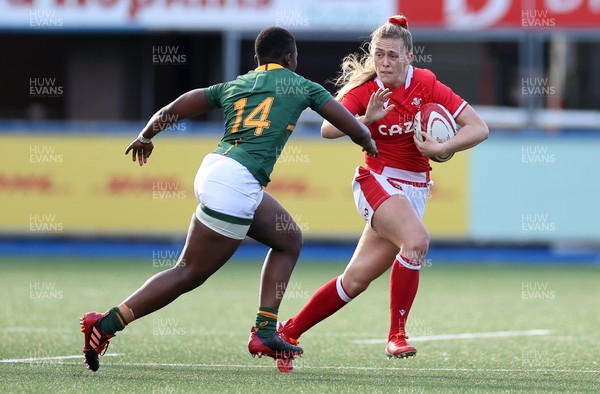 131121 - Wales Women v South Africa Women - Autumn Internationals - Hannah Jones of Wales is tackled by Nomawethu Mabenge of South Africa