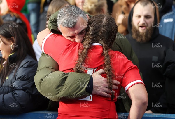 131121 - Wales Women v South Africa Women - Autumn Internationals - Carys Phillips of Wales is hugged by her father Rowland Phillips
