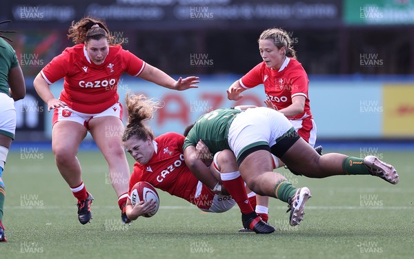 131121 - Wales Women v South Africa Women - Autumn Internationals - Natalia John of Wales is tackled by Babalwa Latsha of South Africa
