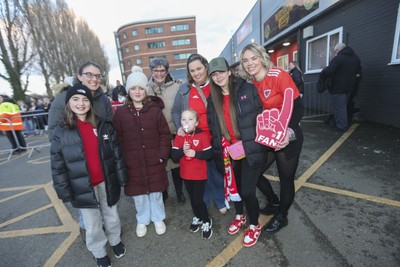 250225 - Wales v Sweden - UEFA Women's Nations League - Fans gather to greet the Wales team arriving 