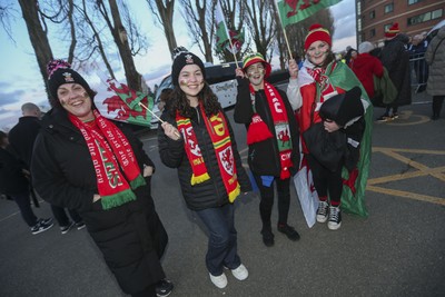 250225 - Wales v Sweden - UEFA Women's Nations League - Fans gather to greet the Wales team arriving 