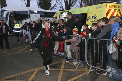 250225 - Wales v Sweden - UEFA Women's Nations League - Fans gather to greet the Wales team arriving 