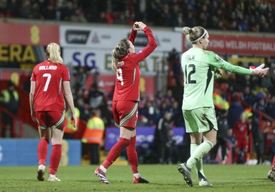 250225 - Wales v Sweden - UEFA Women's Nations League - Kayleigh Barton of Wales (9) celebrates scoring the equalising penalty