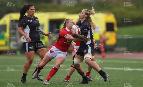 300923 - Wales Women v USA Women, International Test Match - Carys Cox of Wales tackles Erica Jarrell of USA