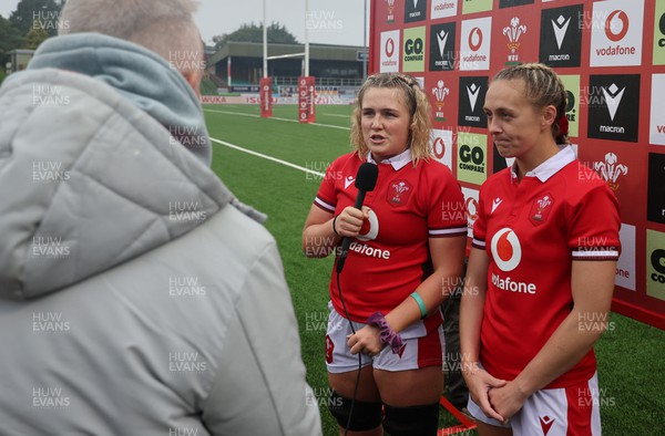 300923 - Wales Women v USA Women, International Test Match - Alex Callender of Wales and Hannah Jones of Wales take part in media interviews at the end of the match