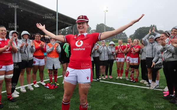300923 - Wales Women v USA Women, International Test Match - Carys Cox of Wales is presented with her first cap at the end of the match