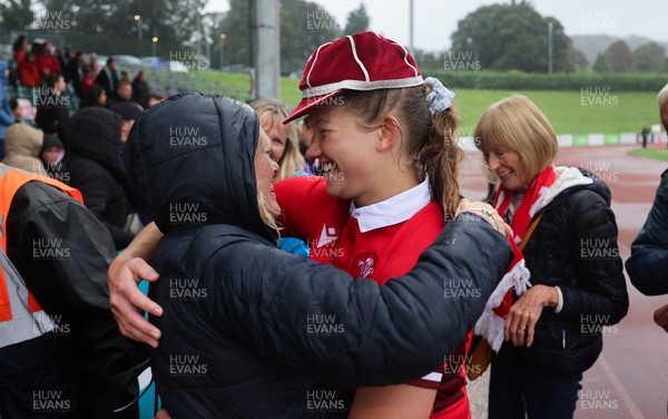 300923 - Wales Women v USA Women, International Test Match - Carys Cox of Wales with family and friends at the end of the match