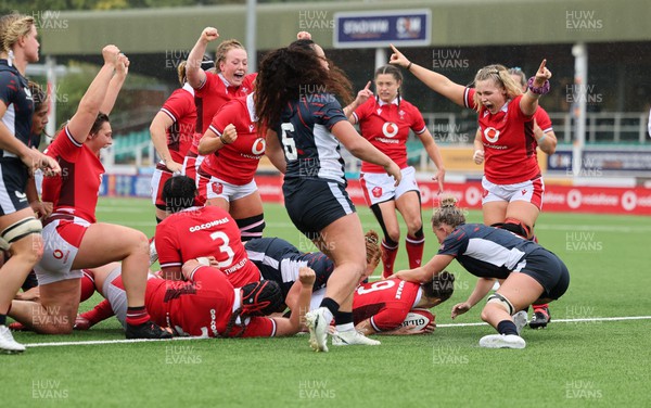 300923 - Wales Women v USA Women, International Test Match - Alex Callender of Wales celebrates as Keira Bevan of Wales powers over to score try