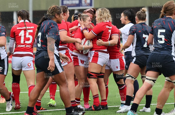 300923 - Wales Women v USA Women, International Test Match - Alex Callender of Wales celebrates with Keira Bevan of Wales after Bevan powers over to score try