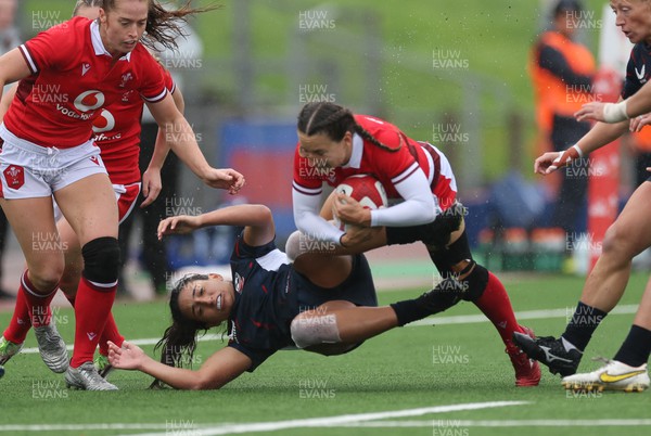 300923 - Wales Women v USA Women, International Test Match - Jasmine Joyce of Wales is tackled by Sarah Levy of USA