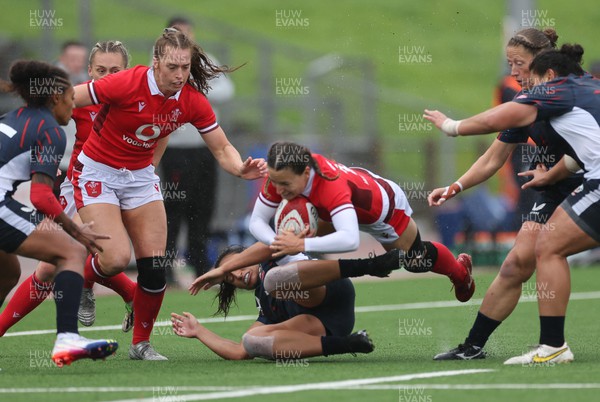 300923 - Wales Women v USA Women, International Test Match - Jasmine Joyce of Wales is tackled by Sarah Levy of USA